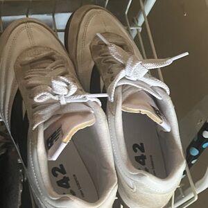 New Balance White and Black Sneakers